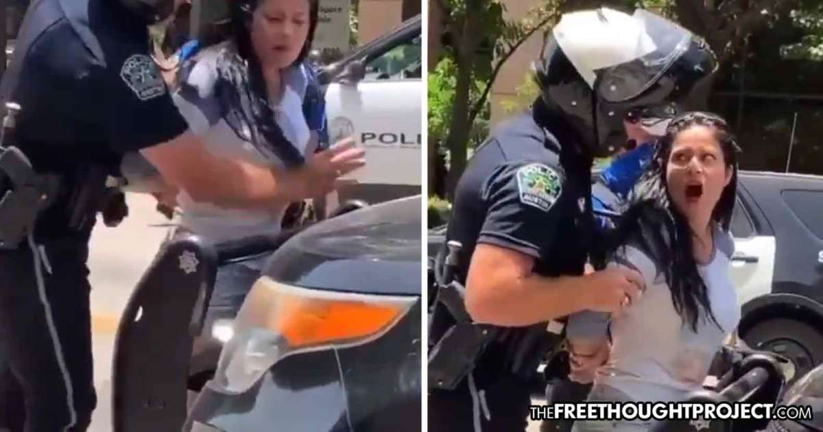 Watch As Onlookers Demand He Stop Cop Repeatedly Gropes Womans Breasts The Free Thought Project 