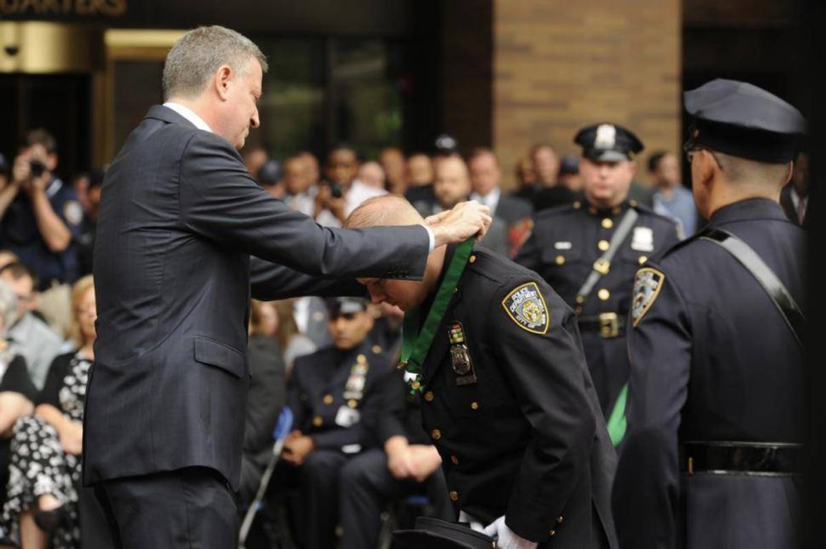 Shortly after NYPD Officer Eugene Donnelly donned his dress blues for a medal ceremony at One Police Plaza, the cockeyed cop sported only his underwear when found in a stranger’s Bronx apartment.