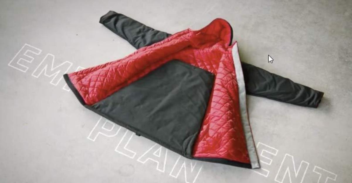 The EMPWR Coat with the sleeping bag folded up in the back
