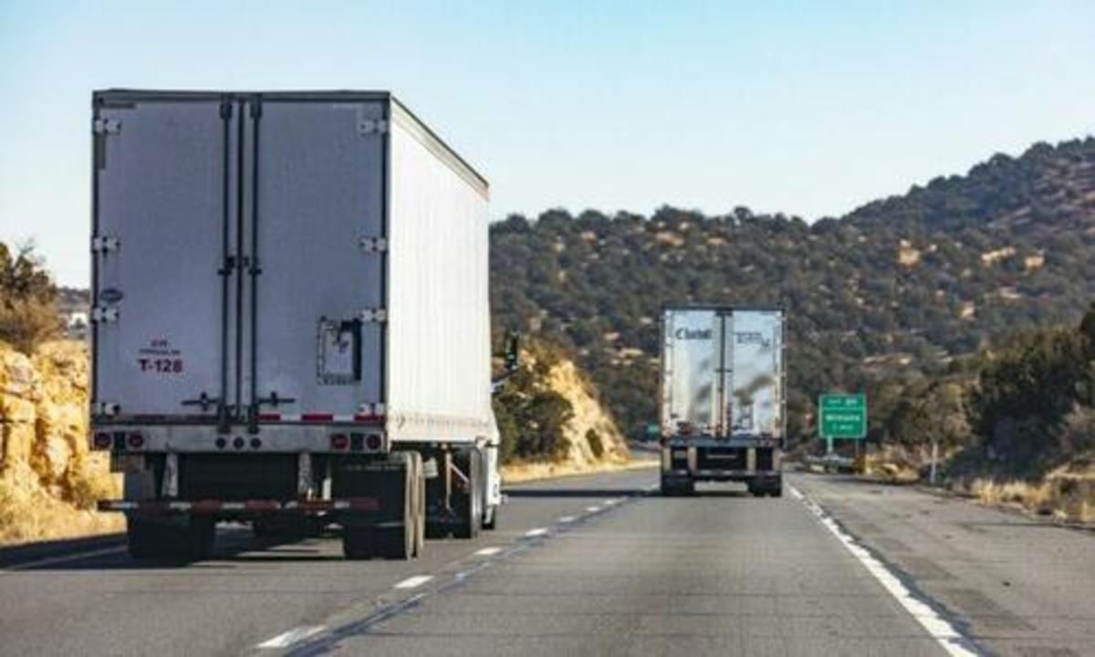 Semi Trucks pass through the state of Arizona on Dec. 3, 2021.