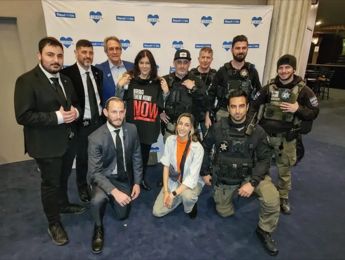 Magen Am leaders can be seen posing with police officers at the March 2024 StandWithUs international conference in Los Angeles in photos posted to LinkedIn.