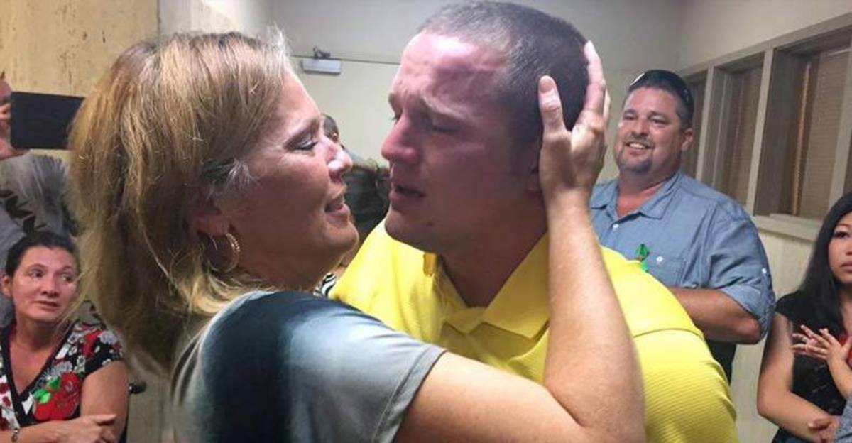 Kyler Carricker and his mother embrace after the jury read the verdict.