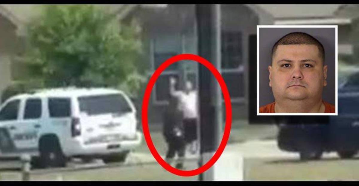 Newly-Released-Graphic-Video-Shows-Cops-Killing-Unarmed-Man-With-His-Hands-Up-from-Far-Away